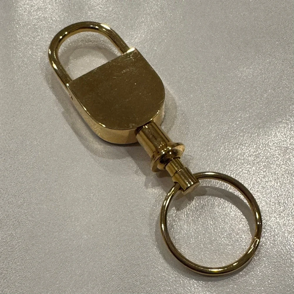 Gold Tone Lock Charm‎ Keychain With Embossed Logo